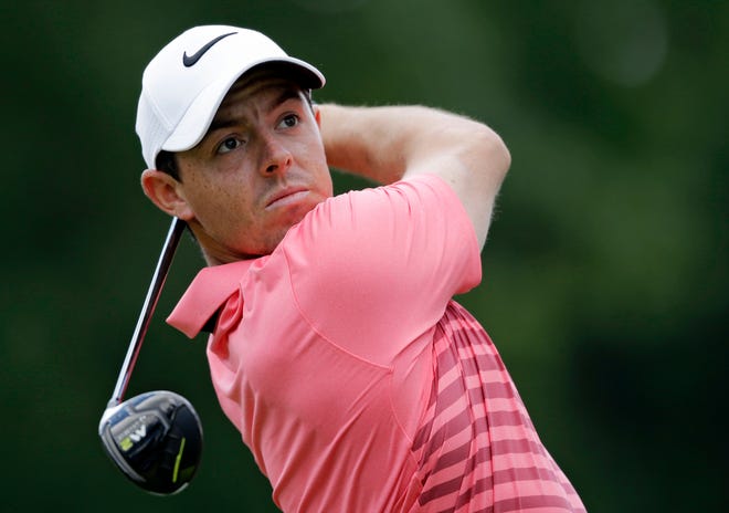 Rory McIlroy, from Northern Ireland, tees off on the third hole during the third round of the Bridgestone Invitational golf tournament at Firestone Country Club, Saturday, Aug. 5, 2017, in Akron, Ohio. (AP Photo/Tony Dejak)