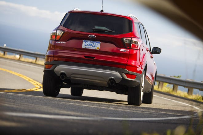 New Ford Escape features an available hands-free, foot-activated power liftgate.