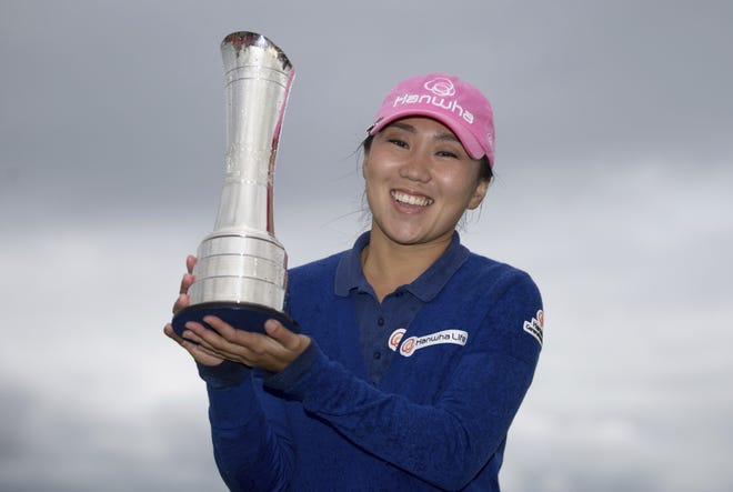 Korea's In-Kyung Kim celebrates her victory with the trophy after her final round during day four of the 2017 Women's British Open at Kingsbarns Golf Links, St Andrews, Scotland, Sunday Aug. 6, 2017. (Kenny Smith/PA via AP)
