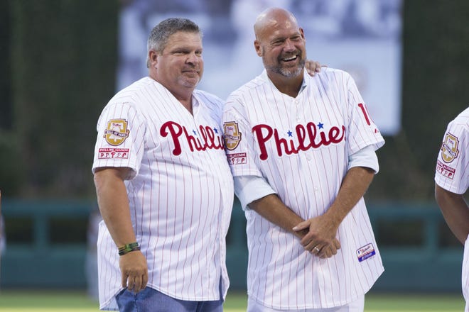 John Kruk (left) and Darren Daulton attend Pat Burrell's induction onto the Phillies' Wall of Fame July 31, 2015.