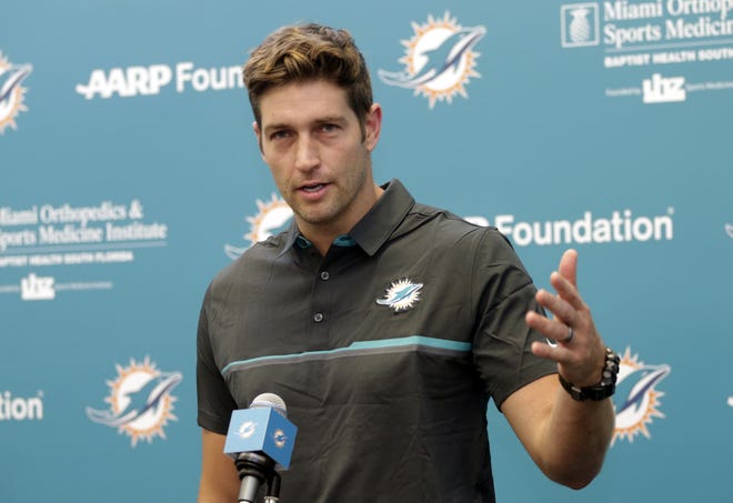 New Miami Dolphins quarterback Jay Cutler speaks at a news conference during training camp Monday in Davie. Cutler has agreed to terms on a $1 million, one-year contract, as starting quarterback Ryan Tannehill could be out for the year with a left knee injury. [AP Photo / Lynne Sladky]
