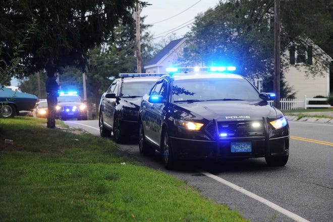 A July 2015 file photo shows Bridgewater police cruisers at the scene of a death investigation.