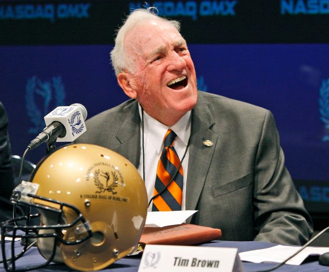 In this Thursday, April 30, 2009 file photo, former Syracuse and Massachusetts coach Dick MacPherson laughs during the announcement of the 2009 College Football Hall of Fame class at NASDAQ Marketsite in New York. MacPherson has died. He was 86.