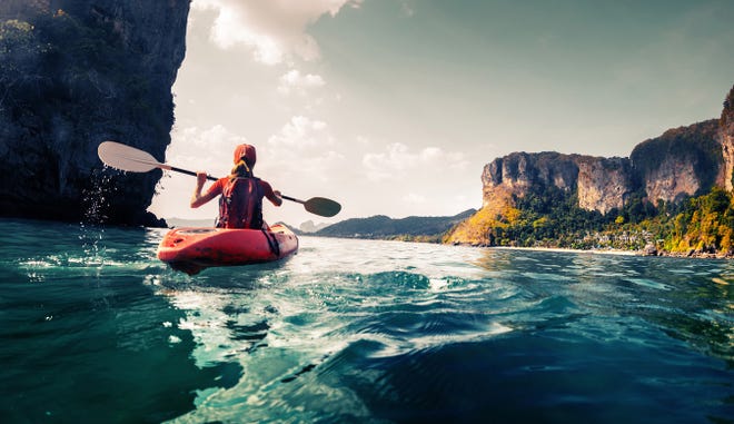 Time in a kayak is nourishing to the body and calming to the mind. Sensuous, too. You can paddle small lakes or rapidly running rivers, and the more skill you develop, the more challenging you can make it. [ISTOCK IMAGE]