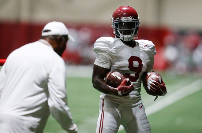 Alabama running backs coach Burton Burns works with running back Bo Scarbrough during practice for the University of Alabama Tuesday, August 8, 2017 as the Crimson Tide prepares to open against Florida State.