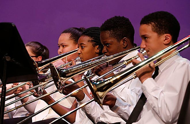 Middle school band students, like these students playing at a Brockton band concert in April 2017, may see their ranks dwindle after instrumental classes for 4th graders are cut from the school budget this year.