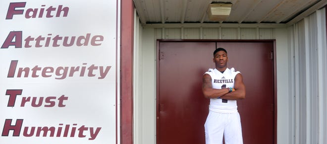 Juanyeh Thomas at the door of the Niceville weight room. [MICHAEL SNYDER/DAILY NEWS]