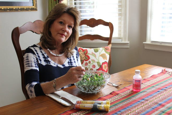 Carole Cape, a real estate agent from Athens, was recently diagnosed with the alpha-gal allergy that makes her allergic to red meat. As a result, Cape’s diet mostly consists of kale salads and roasted nuts. (Photo by Red Denty / Staff)