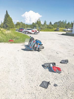 A couple from Ohio were injured yesterday when their motorcycle was struck by a pickup truck at the corner of Levering Road and Inverness Trail in Beaugrand Township.