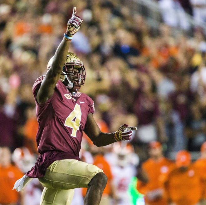 Florida State's Tarvarus McFadden celebrates his interception against Clemson during the second half of a game on Oct. 29, 2016, in Tallahassee. McFadden expects to continue to be tested by opposing offenses despite tying for the national lead in interceptions last season. [AP Photo / Mark Wallheiser, File]