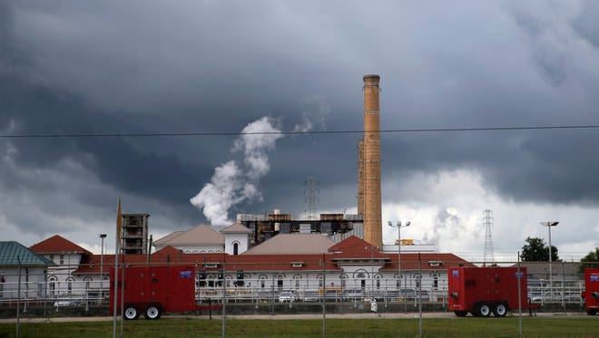 Rain clouds gather over the New Orleans Sewerage & Water Board facility, where turbines that power pumps have failed, in New Orleans, Thursday, Aug. 10, 2017.  Gov. John Bel Edwards declared a state of emergency in New Orleans on Thursday as the city’s malfunctioning water-pumping system left some neighborhoods at greater risk of foul-weather flooding. The city scrambled to repair fire-damaged equipment at a power plant and shore up its drainage system, less than a week after a flash flood from torrential rain overwhelmed the city’s pumping system and inundated many neighborhoods.  (AP Photo/Gerald Herbert) (AP Photo/Gerald Herbert)