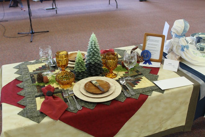 Andrea Smith's award winning tablescape, which depicts the contest theme of "High Country Celebrations," and is titled "Flatlander's Welcome — A Taste of the Mountains," at the Creative Colorado Table Setting Contest in Estes Park, Colo. The event was held as a fundraiser for the Estes Park Museum. [RICHARD SMITH/THE ASSOCIATED PRESS (2016)]