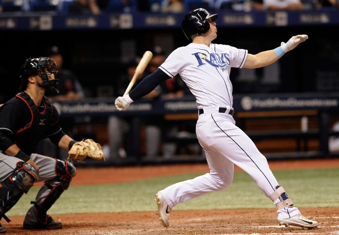 Tampa Bay Rays' Corey Dickerson watches his three-run home run off Indians reliever Nick Goody during the eighth inning of a baseball game Thursday, Aug. 10, 2017, in St. Petersburg, Fla. (AP Photo/Steve Nesius)