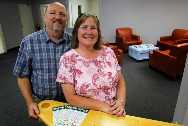 Business owners Jeff and Julie Weathers show off BizHub, at 407 North Lafayette Street in Shelby. [Brittany Randolph/The Star]