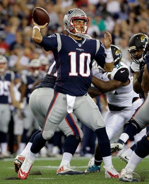 New England Patriots quarterback Jimmy Garoppolo passes against the Jacksonville Jaguars in the second half of an NFL preseason football game, Thursday, Aug. 10, 2017, in Foxborough, Mass.