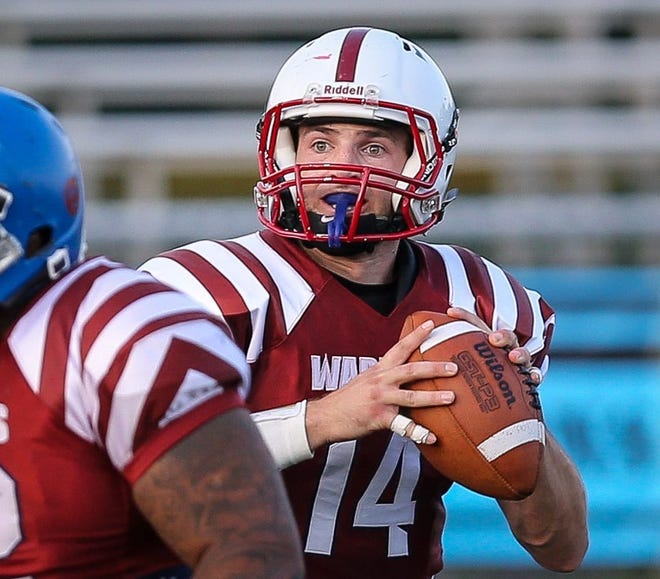 Mass. Warriors quarterback Joseph Esposito, looking for an open receiver during win over the Mid-Coast Falcons last weekend, has thrown seven touchdowns and no interceptions in team's first three games. [Daily News and Wicked Local Photo/Dan Holmes]