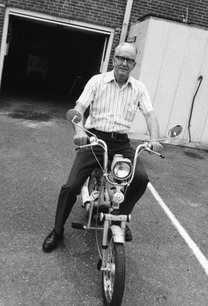 Pat Poteat aboard a scooter given to him as a retirement gift from Drexel Heritage Furniture in 1977 at age 65. He worked at the furniture factory for 50 years. [PHOTO SUBMITTED BY BILL POTEAT/SPECIAL TO THE GASTON GAZETTE]