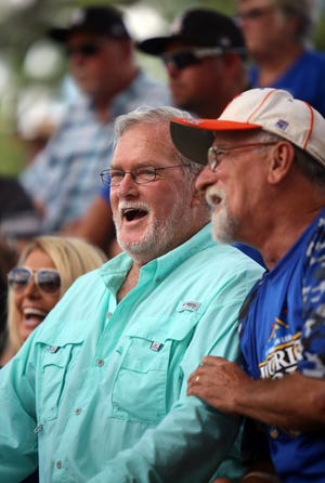 Dan Gold catches a baseball game with friends at the American Legion World Series on Saturday. [Brittany Randolph/The Star]