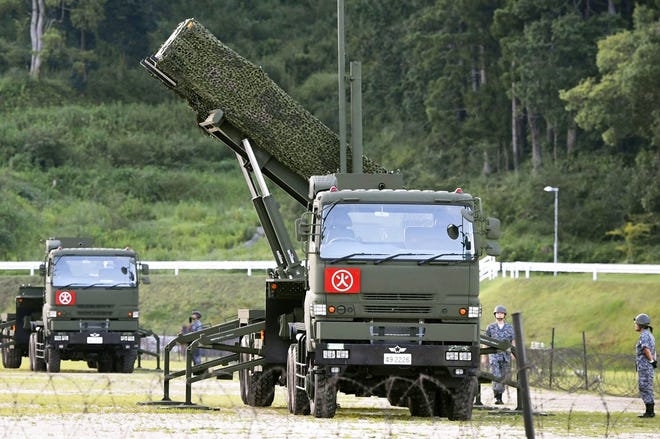 A PAC-3 interceptor is deployed in the compound of a garrison of the Japan Ground Self-Defense Force in Konan, Kochi prefecture, Japan, Saturday, Aug. 12, 2017. Japan started deploying land-based Patriot interceptors after North Korea threatened to send ballistic missiles flying over western Japan and landing near Guam. The Defense Ministry said Friday the PAC-3 surface-to-air interceptors are being deployed at four locations - Hiroshima, Kochi, Shimane and Ehime. (Ryosuke Ozawa/Kyodo News via AP)