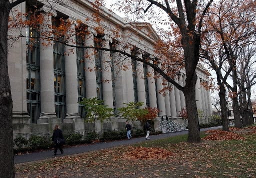 Students walk through the Harvard Law School area on the campus of Harvard University
