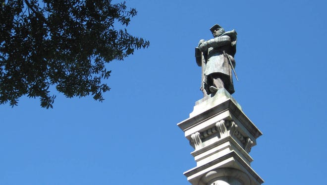 The Confederate soldier statue atop Hemming Park’s Confederate memorial. (Times-Union, file)