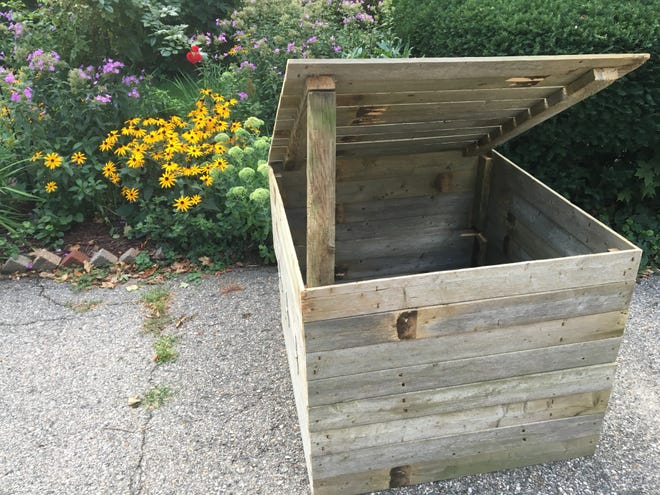 This composting bin has the added benefit of being made from reclaimed wood. [Contributed]