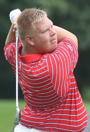 Garaway's Ethan Miller watches his tee shot on the eighth hole at Union Country Club during the Inter-Valley Conference Preseason Tournament Monday. (TimesReporter.com / Jim Cummings)