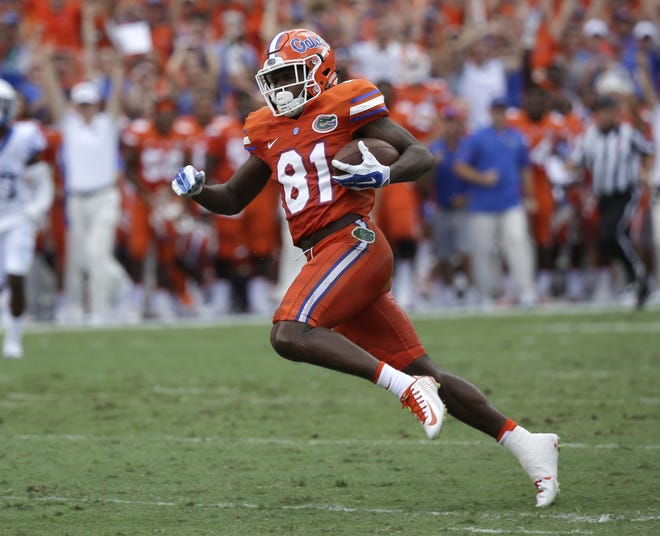 Florida wide receiver Antonio Callaway (81) runs after a reception against Kentucky in the first half of a game on Sept. 10, 2016, in Gainesville. Florida has suspended Callaway and six others for at least the team's season opener against Michigan. [AP Photo / John Raoux]