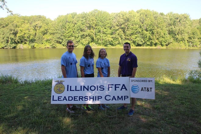 Scales Mound FFA members recently attended the annual FFA Leadership Camp at 4-H Memorial Campgrounds in Monticello. Pictured, from left: Cameron Ziarko, Jenna Korte, Mickenzie Bass and Illinois FFA Secretary Dalton Painter. [PHOTO PROVIDED]