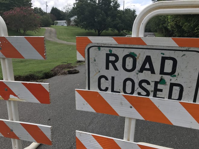 Part of Crestview Drive is closed until further notice after damage from flooding this weekend. [Joyce Orlando/The Star]