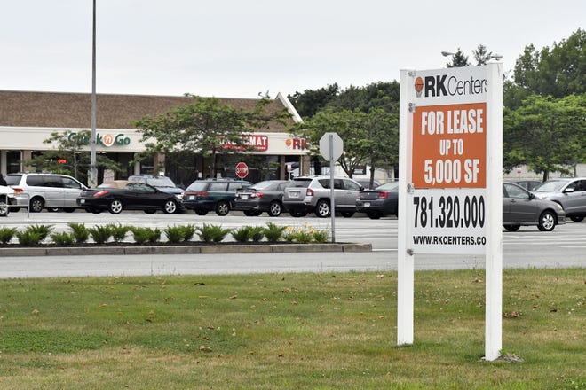 A sign advertises 5,000 sq. ft. of space available for rent in the Brown's Lane Shopping Plaza in Middletown.