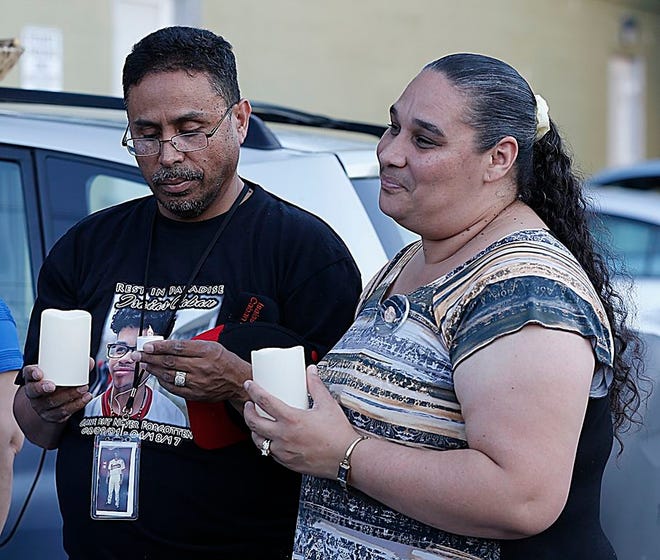 Frances Arriaga, right, at a candlelight vigil for her son Isaias Caban on May 18, 2017. Arriaga started a foundation last month, in honor of Caban, to promote and encourage youth driving safety.