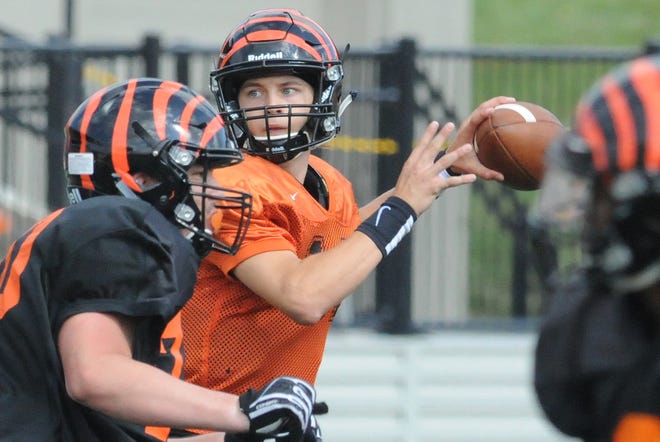 Aiden Longwell of Massillon looks for an open teammate during a scrimmage against the Berea-Midpark Titans on Saturday. (CantonRep.com / Michael Balash)