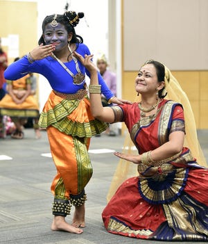 Sarina Sallapudi, 9, will play the youngest Krishna and her mother, Neetha Sallapudi, the Hindu deity’s mother in the SaiNrityalaya School of Dance production of “Tales of a Loveable Thief” at the Sarasota Opera House. [Herald-Tribune staff photo / Thomas Bender]