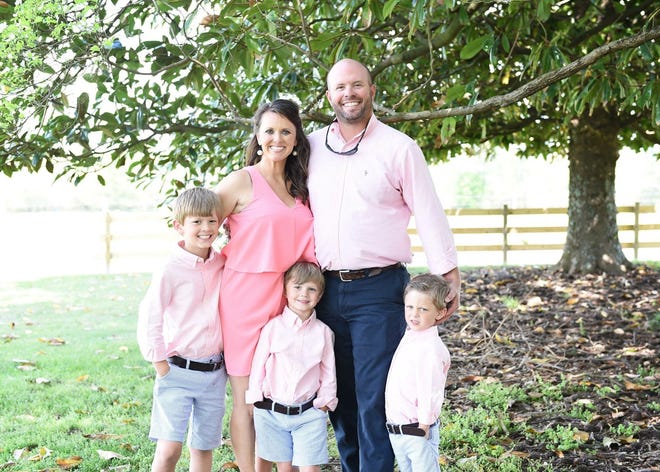 Courtney and Eric Waldrop with sons Saylor, Wales and Bridge of Albertville are now awaiting new additions to the family. Courtney is the expantant mother of sextuplets. [Special to the Times]