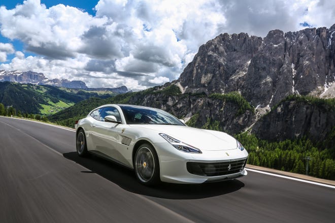 The Ferrari GTC4 Lusso uses Ferrari's 4RM system, first introduced on the FF, which integrates traction controls, electronic differential and stability controls combined with an all-wheel steering system to allow for more confident, comfortable aggressive driving. [LORENZO MARCINNO / TNS]