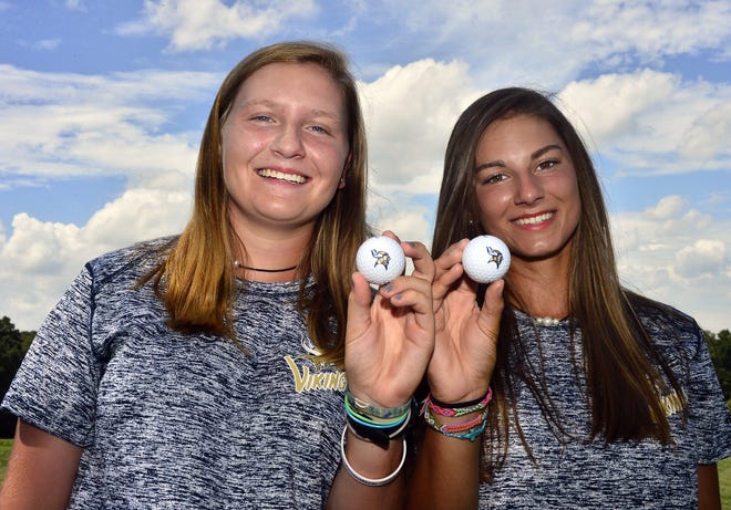 Juniors Anna Morgan, left, and Elle Johnson had successful summers and now settle in to lead the Spartanburg High golf team. [ALEX HICKS JR./Spartanburg Herald-Journal]