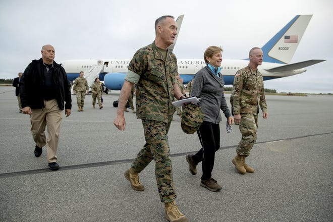 Joint Chiefs Chairman Gen. Joseph Dunford arrives at Fort Greely, Alaska, Saturday, Aug. 19, 2017, for a refueling stop. President Donald Trump is "studying and considering his options" for a new approach to Afghanistan and the broader South Asia region, the White House said Friday. Gen. Joseph Votel, the Central Command chief who is responsible for U.S. military operations in the greater Middle East, including Afghanistan said that Defense Secretary Jim Mattis and Dunford represent him in the White House-led Afghanistan strategy review. (AP Photo/Andrew Harnik)
