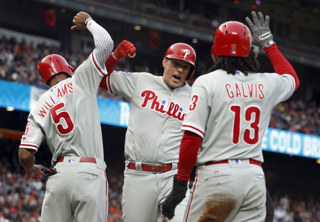 The Phillies' Rhys Hoskins (center) celebrates his third-inning three-run home run against the Giants on Saturday, Aug. 19, 2017, in San Francisco.