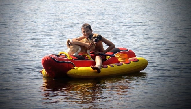 Another Moose in New Hampshire

Moose, a 6-year-old puggle, paddles along on a hotdog float with his best friend, George Gibson of Stoughton, on Half Moon Lake in New Hampshire in this shot taken by George's mom, Sue. The summer activity is one of their favorite things to do together.
