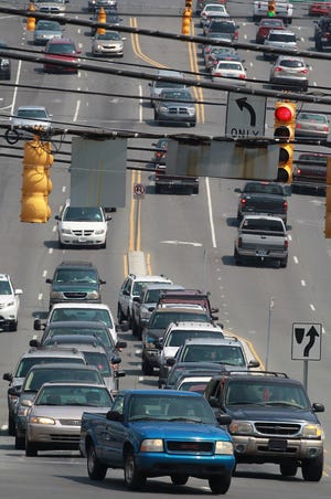 Traffic on Cox Road fills both the north and south lanes between East Franklin Blvd and I-85 on a recent afternoon. [Mike Hensdill/The Gaston Gazette]
