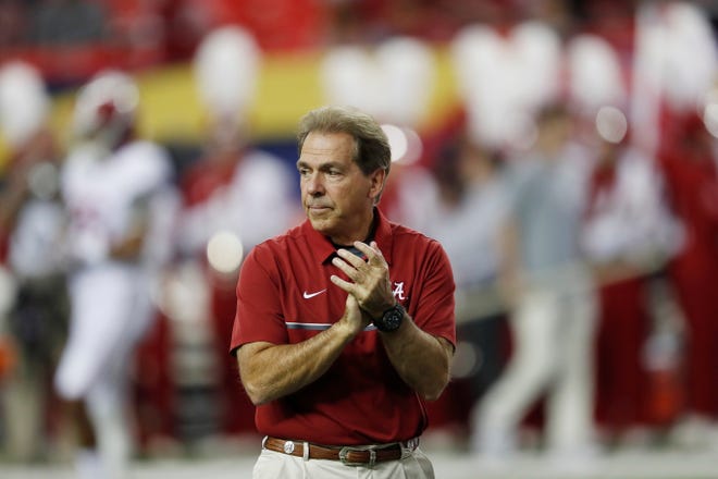 FILE - In this Dec. 3, 2016, file photo, Alabama coach Nick Saban watches his team warm up for the Southeastern Conference championship NCAA college football game between Alabama and Florida in Atlanta. Alabama has the No. 1 spot in The Associated Press' preseason media poll. Saban's Tide has become the surest thing in sports these days. They don't always win the national championship just half the time over the last eight years–but they are always in contention. Since 2008, only once has the Tide lost more than one game before bowl season. (AP Photo/John Bazemore, File)