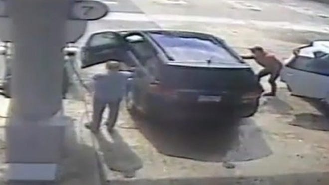 Thief opening the door before stealing a bag of cash and jewelry. Image from WPLG.