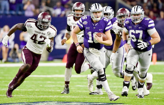 Kansas State quarterback Jesse Ertz, center, scampers past Texas A&M linebacker Otaro Alaka, left, during the second half of the Texas Bowl in December in Houston. (DECEMBER 2016 FILE PHOTOGRAPH/THE ASSOCIATED PRESS)
