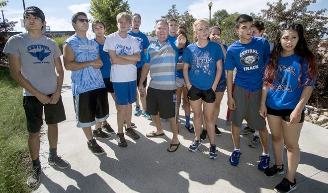 Dean Gray (center) Central High School cross-country coach shows team members the trail they will run at the Pueblo Colo. riverwalk on Aug. 23, 2017. (John Jaques,The Pueblo Chieftain)