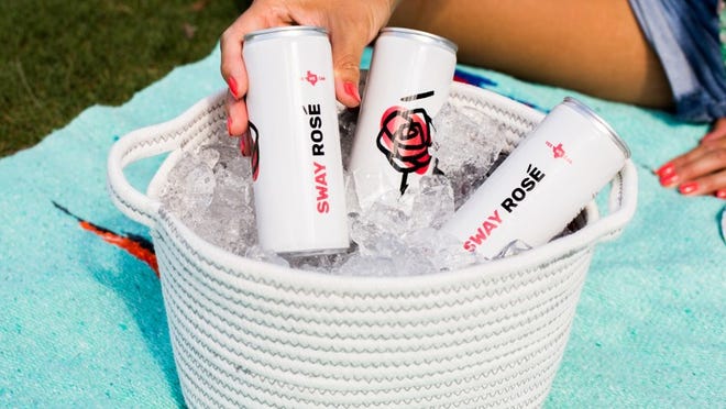 No need to picnic with a cumbersome bottle of wine: Sway Rosé, a new Texas wine, comes in three-packs of cans.