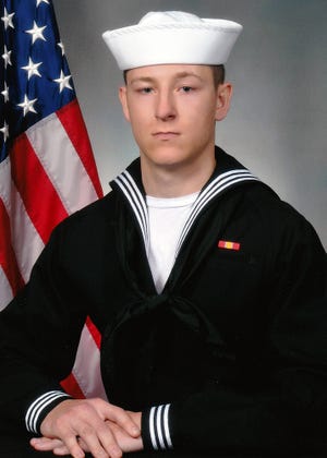 In this undated photo released by the U.S. Navy shows Electronics Technician 3rd Class Kenneth Aaron Smith from Cherry Hill, N.J. Smith, 22, was stationed aboard USS John S. McCain when it collided with an oil tanker near Singapore on Monday, Aug. 21, 2017. His body was recovered on Aug. 24. (U.S. Navy via AP)
