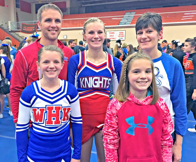 Jeremy and Renee Burnison could always be found at their daughters' activities, such as this West Holmes basketball game where they are pictured with Jordyn, left, Taylor and Kennedy.