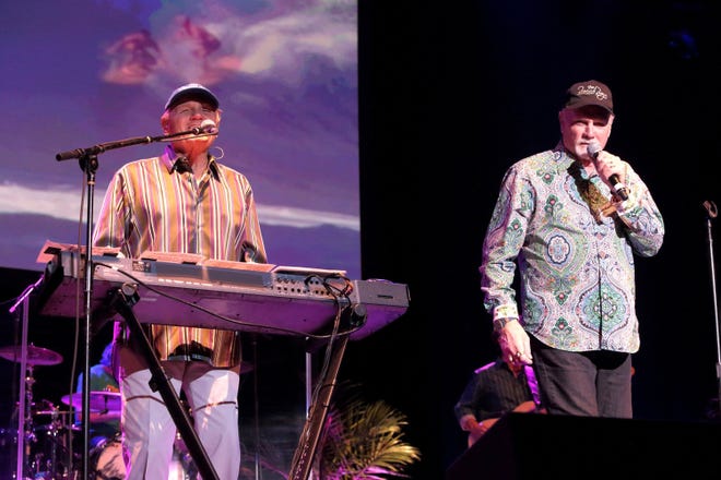 Bruce Johnston, left, and Mike Love of The Beach Boys, are shown performing at a Baltimore concert in 2016. The band will be at Chautauqua Institution on Saturday. [THE ASSOCIATED PRESS]