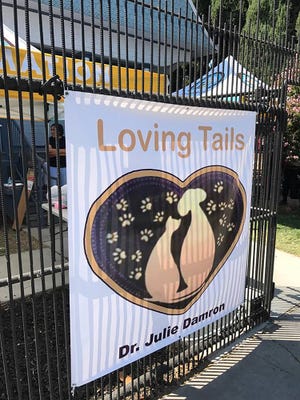 Loving Tails is a free vaccination clinic for the pets of the homeless or low income. [COURTESY OF JULIE DAMRON]